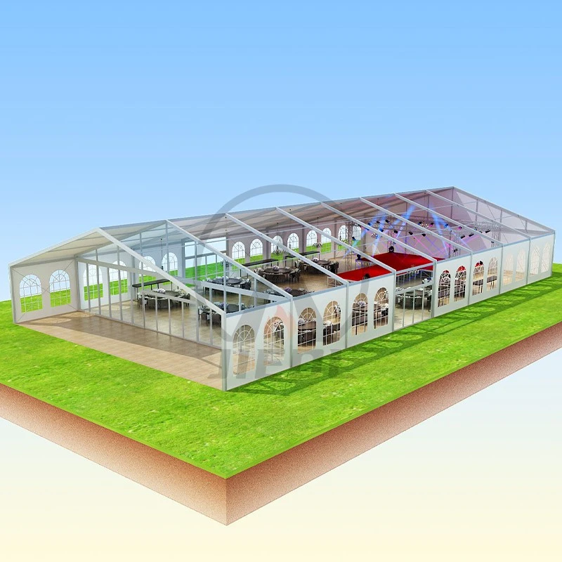 Wedding tent with elegant arch windows and stage lighting Wedding tent with elegant arch windows and stage lighting